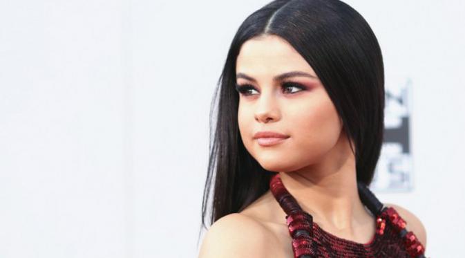 Justin Bieber dan Selena Gomez memilih tak menghadiri Grammy Awards 2017. (AFP/Bintang.com)