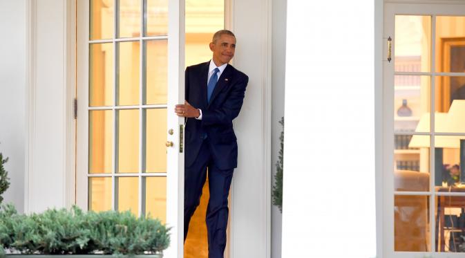 Presiden Obama beberapa jam sebelum lengser di Gedung Putih 20 Januari 2017 (Jim Watson/AFP)