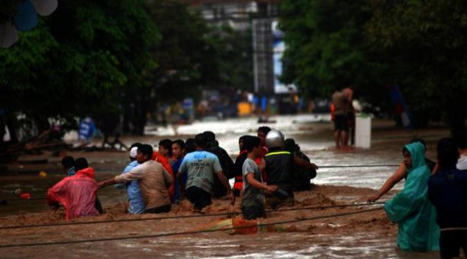 Banjir bandang yang menerjang Sulawesi Utara pada 2014 merenggut nyawa 19 warga dan memorakporandakan ribuan rumah. (Liputan6.com/Yoseph Ikanubun)