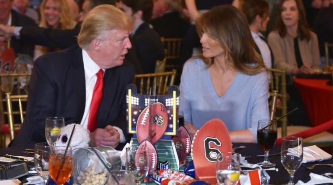 Donald dan Melania Trump menghadiri Super Bowl, Minggu (5/2/2017). (AFP/Bintang.com)