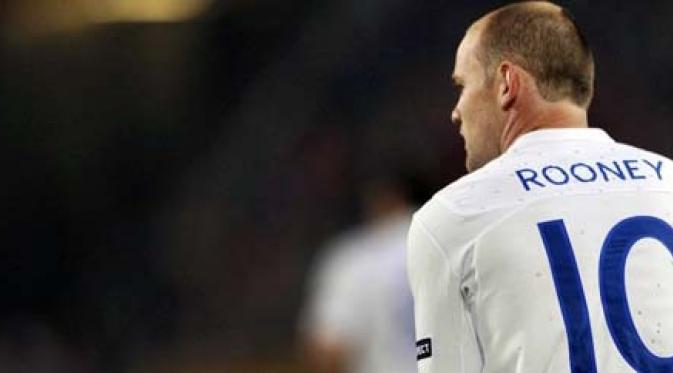 Ekspresi striker Inggris Wayne Rooney di laga lanjutan kualifikasi Euro 2012 Grup G melawan Swiss di St. Jakob Stadium, Basel, 7 September 2010. AFP PHOTO / FABRICE COFFRINI 