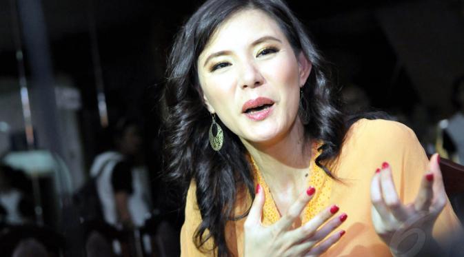Wanita berusia 37 tahun ini akan memilih figur yang memiliki ketegasan ala Indonesia. Jakarta (31/5/14) (Liputan6.com/Panji Diksana)
