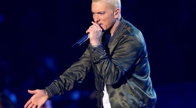 Eminem mencoba mengakhiri hidupnya dengan melakukan overdosis Tylenol karena pacarnya Kim meninggalkannya dan mencegahnya untuk melihat anak perempuannya. (Frederick M. Brown/Getty Images/AFP)
