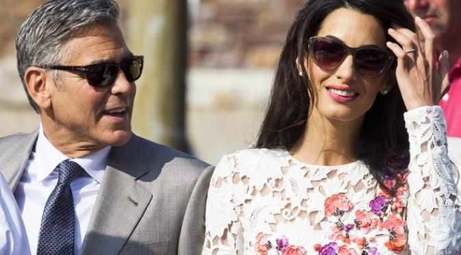 George Clooney dan Amal Alamuddin sehari setelah menikah. (dok. People)