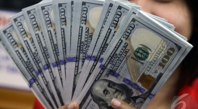 Nilai tukar rupiah terhadap dolar Amerika Serikat (AS) terus menguat, Jakarta, Kamis (23/10/2014) (Liputan6.com/Johan Tallo) 