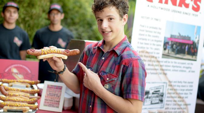 Asa Butterfield yang sempat menyatakan minatnya untuk bermain sebagai Spider-Man, memiliki saingan baru, Nolan Gould. (Foto: US MAGAZINE)