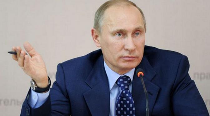 Vladimir Putin, Presiden Rusia sejak 7 Mei 2012 silam, berhasil meraih jajak pendapat bergengsi versi TIME.