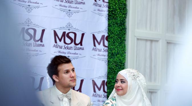 Sayang... balas senyumku dong. (Fathan Rangkuti/Bintang.com)