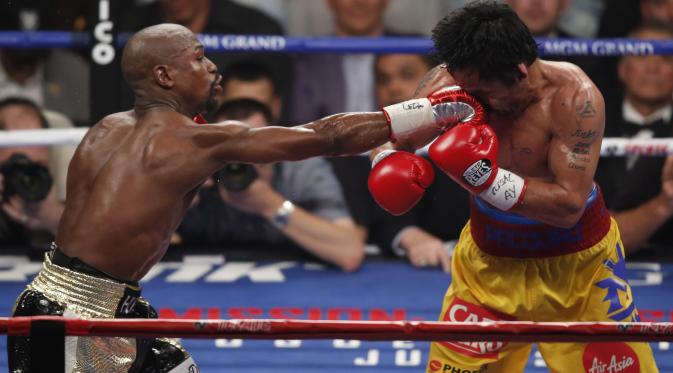 Floyd Mayweather vs Manny Pacquiao (AP Photo/Eric Jamison)