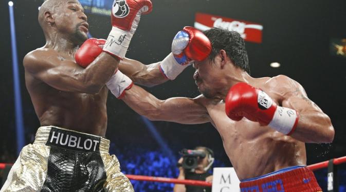 Floyd Mayweather vs Manny Pacquiao (AP Photo/John Locher)