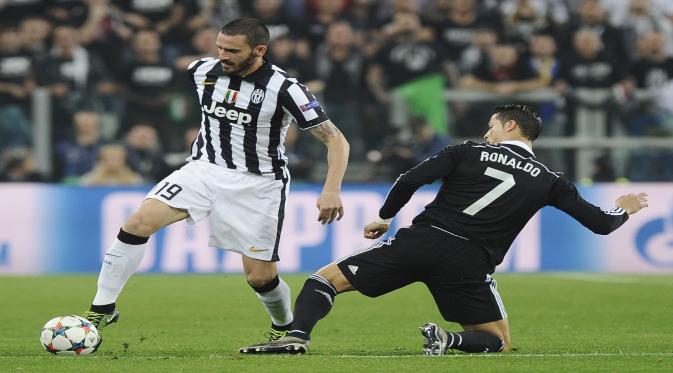 Leonardo Bonucci bekerja keras menahan gempuran penyerang Madrid seperti Cristiano Ronaldo (Reuters / Giorgio Perottino)