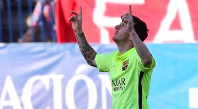 Ekspresi Lionel Messi setelah mencetak gol. (AFP PHOTO / CESAR MANSO)