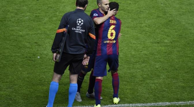 Xavi Hernandez menggantikan Andres Iniesta pada laga final Liga Champions Barcelona melawan Juventus ( ODD ANDERSEN / AFP)