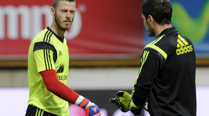 BALIK - David De Gea kembali ke Manchester usai beberapa hari menjalani liburan di Kota Madrid. (REUTERS/Eloy Alonso)