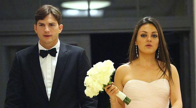 Ashton Kutcher dan Mila Kunis dikabarkan telah melangsungkan pernikahan diam-diam. (via condenast.co.uk)