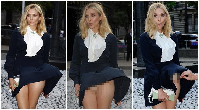 Celana dalam Elizabeth Olsen terlihat setelah gaunnya tersibat angin. (via dailymail.co.uk)