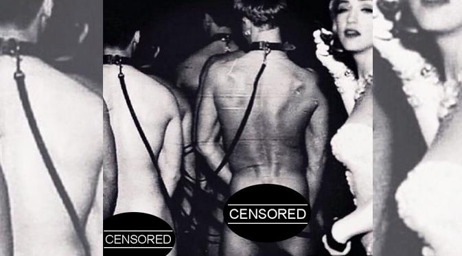 Madonna memperlihatkan foto yang mengkritik gambar Justin Bieber tanpa busana. (foto: aceshowbiz)