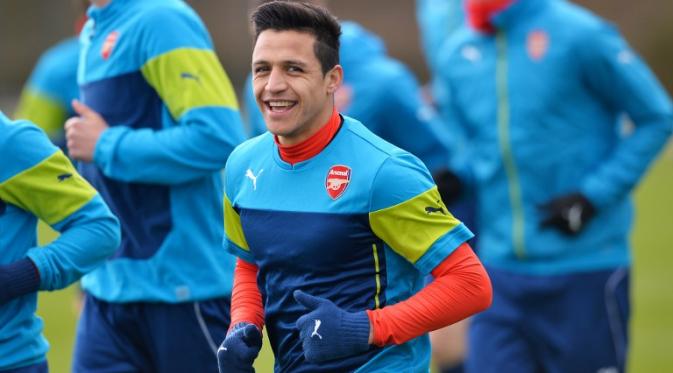 Alexis Sanchez sedang menikmati liburan pasca membela Cile di Copa America 2015