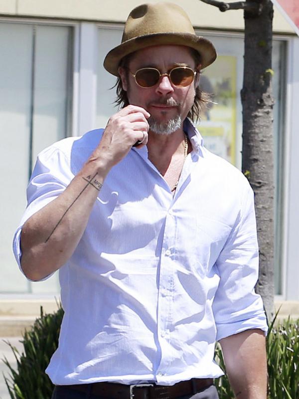 Tato baru Brad Pitt. (foto: eonline)