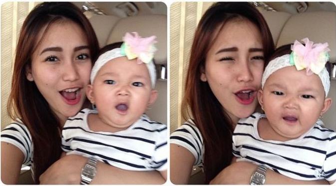 Ayu Ting Ting menggendong anaknya Bilqis Khumairah Razak (Instagram)