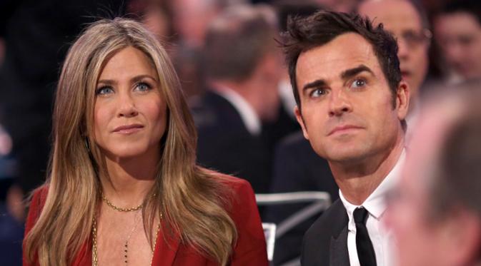Jennifer Aniston dan Justin Theroux menghadiri  acara Critics' Choice Movie Awards ke-20 di California pada 15 Januari 2015. Pasangan yang bertunangan sejak 2012 lalu itu telah resmi menikah pada Rabu (5/8) secara diam-diam.(Christopher Polk/Getty Images)
