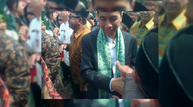Jokowi resmi membuka Muktamar ke XIX sekaligus peringatan Hari Lahir (Harlah) Mathla'ul Anwar. (Liputan6.com/Yandhi Deslatama)