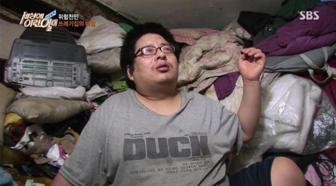 Anak sang pemilik rumah yang terjebak ditimbunan sampah/Koreaboo.com