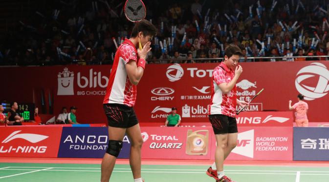 Ganda campuran Indonesia Tontowi Ahmad/Liliyana Natsir lolos ke babak ketiga Total BWL World Championships 2015 di Istora Senayan, Selasa (11/8/2015). (Liputan6.com/Humas PP PBSI)