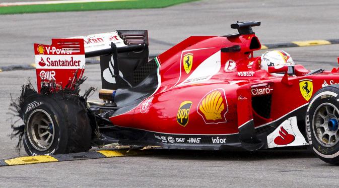 Pebalap Ferrari Sebastian Vettel