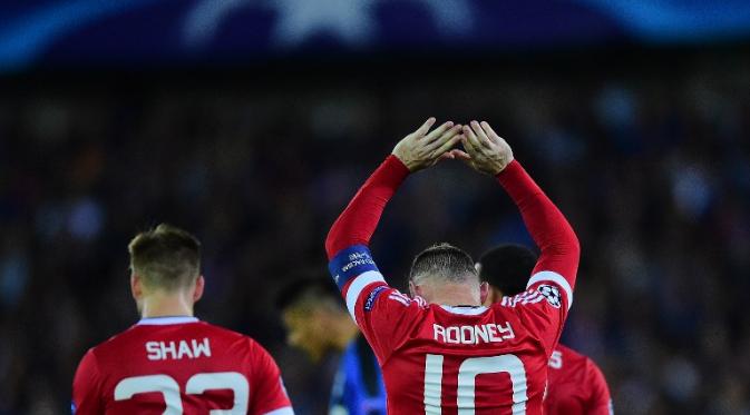 Striker Manchester United Wayne Rooney merayakan gol ke gawang Club Brugge pada leg kedua play-off Liga Champions di Jan Breydelstadion, Kamis (27/8/2015). (Liputan6.com/EMMANUEL DUNAND / AFP)