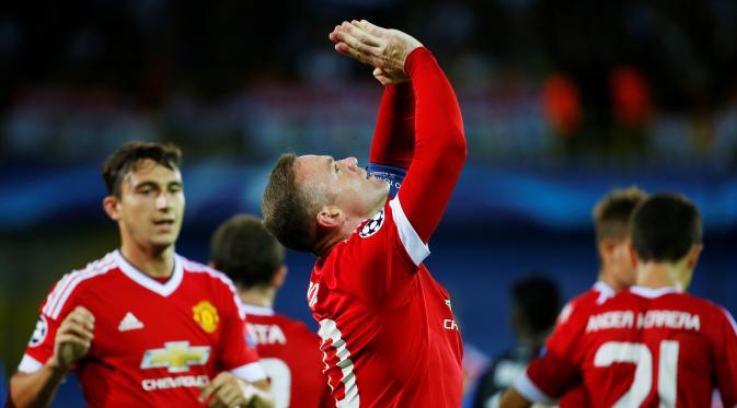 Ekspresi Rooney saat mencetak gol ketiga melawan Club Brugge