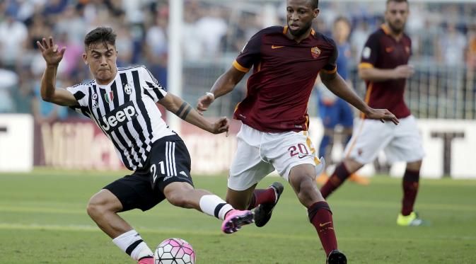 Aksi Paulo Dybala saat melawan AS Roma. Dybala mencetak gol balasan Juventus. (Reuters/Max Rossi)